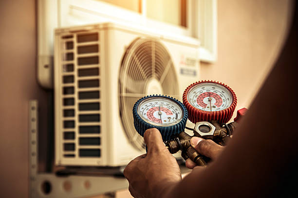 Professional Hvac Installation technician working in Wetumpka, AL